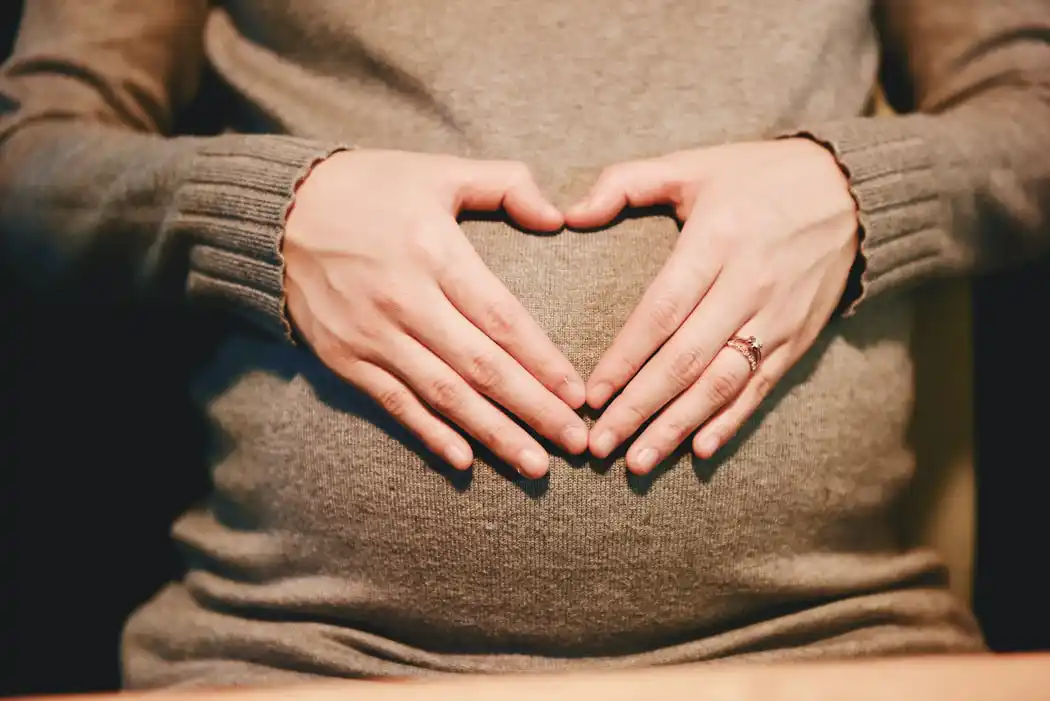 Chiropractic Huntsville AL Hands on Pregnant Belly