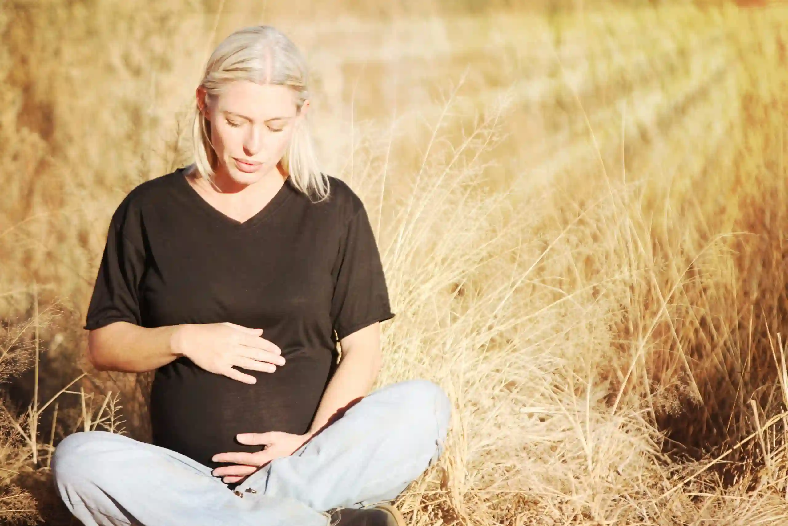 Chiropractic Huntsville AL Pregnant Woman in Field
