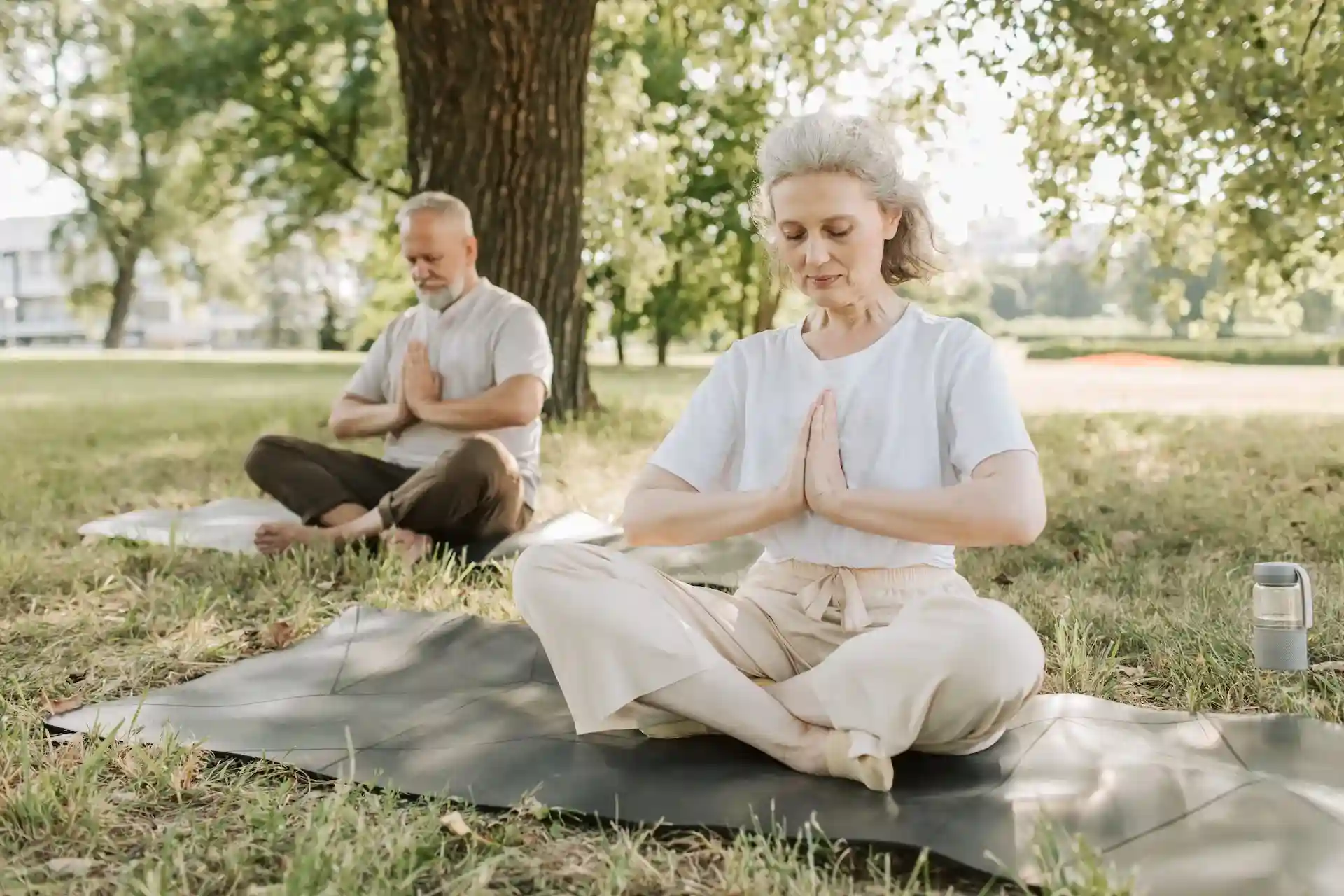Chiropractic Huntsville AL Aging Couple Doing Yoga